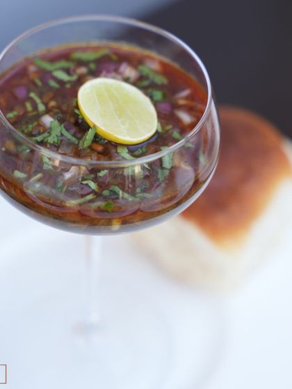 Even our Misal Pav gets a fine dining twist. The spicy sprout gravy is served elegantly in a coupe glass, ready to be poured over the farsan and enjoyed with pav.