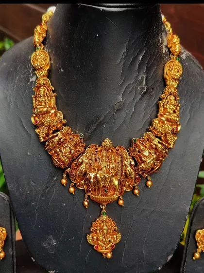 This is a classic piece from my temple jewellery collection. The set features intricate carvings of deities, crafted in a traditional South Indian style that adds a divine touch to any ethnic outfit for festivals and weddings.