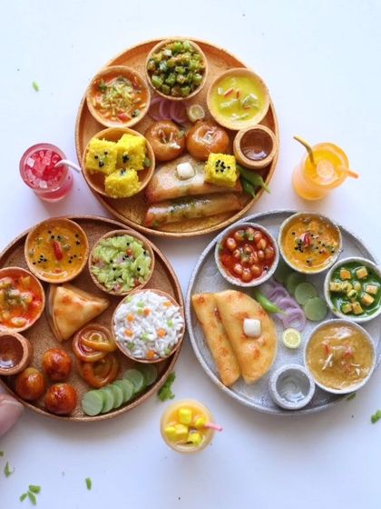 A beautiful collection of three different Indian thalis, showcasing the diversity of my courses.