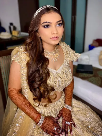 A more serious and posed shot of Khushbu. Her makeup looks just as flawless, showcasing the versatility of the look.