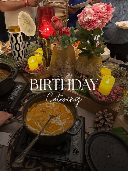 A birthday celebration filled with joy and delicious food. Our buffet setup, decorated with candles and flowers, created a warm and festive ambiance for the special day.