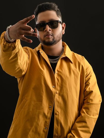 A clean, confident look. This is my Spotify profile picture. It's simple, direct, and shows I mean business.