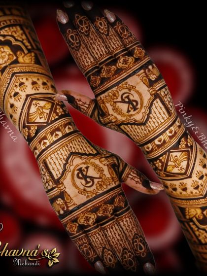 A stunning bridal design featuring custom initials and traditional bird motifs. The dark, rich paste promises a beautiful stain for the big day.