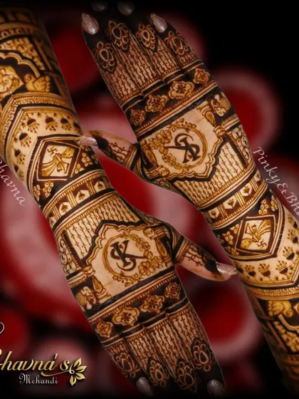 A stunning bridal design featuring custom initials and traditional bird motifs. The dark, rich paste promises a beautiful stain for the big day.