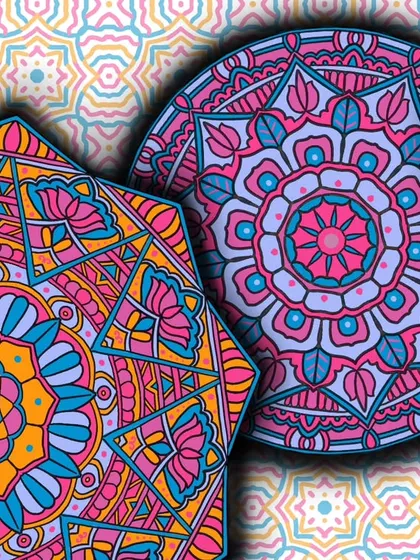 A detailed view of my layered mandala art. This composition explores the interplay of different shapes and vibrant colors, reflecting the different phases of my own personal and artistic journey.