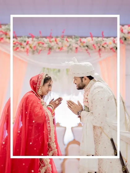 A beautiful moment from the wedding reception ceremony, with the bride and groom looking at each other with love.