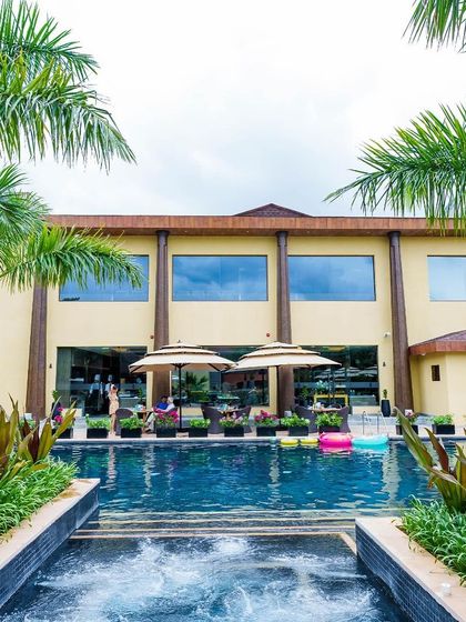 Our poolside area, complete with an open-air jacuzzi, is a central hub of relaxation. The expansive layout ensures you can find both social spots and quiet corners to suit your mood.