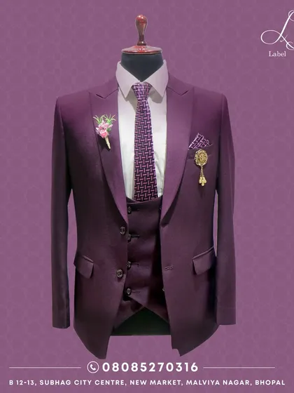 Color can be formal too. This three-piece suit in a deep wine color is tailored for a sharp, modern silhouette. It shows how we can move beyond traditional colors to create something that is totally you for a wedding or special event.