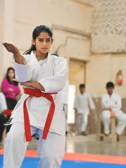 A classic open-hand block, executed with perfect form. This defensive technique is fundamental to the art of Shito Ryu karate.