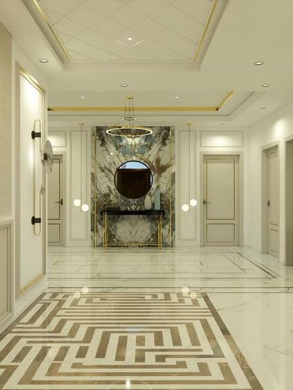 This view highlights the Ganesha artwork on a fluted wall panel, adding a spiritual and artistic touch to the modern entrance lobby.