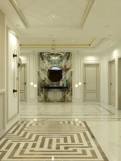 This view highlights the Ganesha artwork on a fluted wall panel, adding a spiritual and artistic touch to the modern entrance lobby.