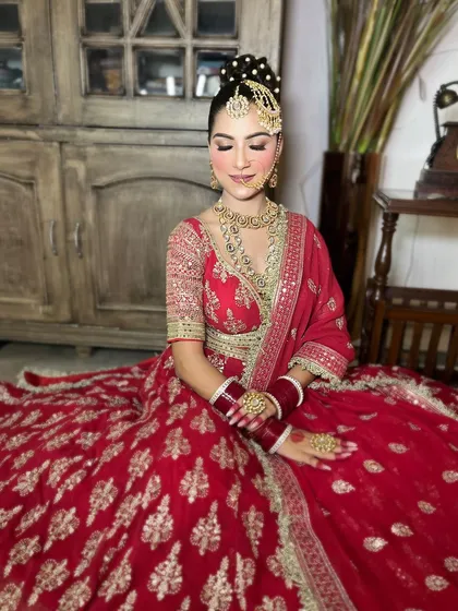 An extensive series of our classic red bridal lehenga. These images capture every detail, from the embroidery to the full bridal styling, providing a complete reference.