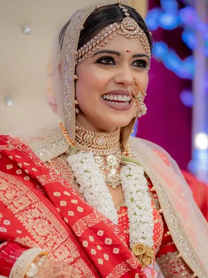 A beautiful candid of my bride Manali, her smile lighting up the frame during her wedding.