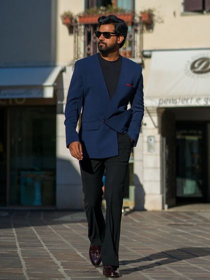 The clean, modern design of the lapel-free blazer is perfect for the minimalist gentleman.