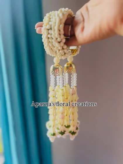 For brides, I craft these delicate fresh floral Kalire. Made from fragrant jasmine buds and accented with small golden jhumkis, they are a beautiful and natural alternative to traditional metal kalire for the wedding ceremony.