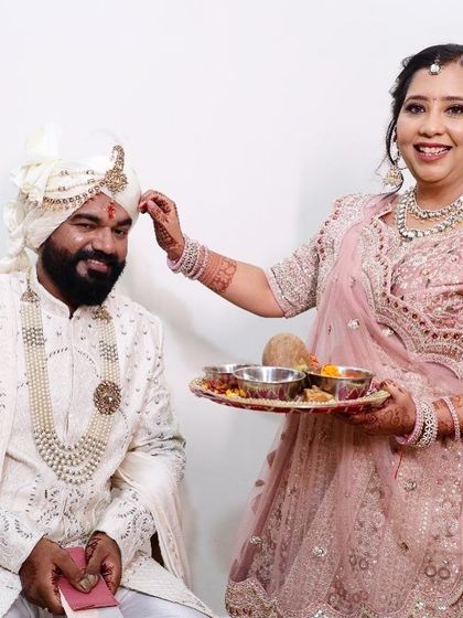 A sister of the groom performing a traditional ritual. I gave her a soft and elegant makeup look that was perfect for the daytime ceremony.