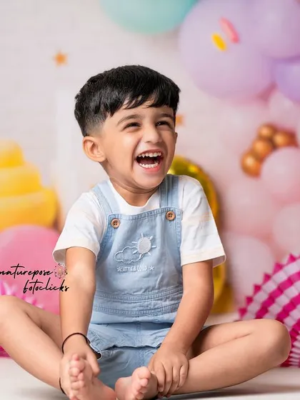 Pure, unfiltered joy! Milestone birthdays are a whirlwind of excitement, and we love capturing the vibrant energy of your child's celebration. This third birthday shoot was filled with laughter against a custom-designed candy-themed backdrop.