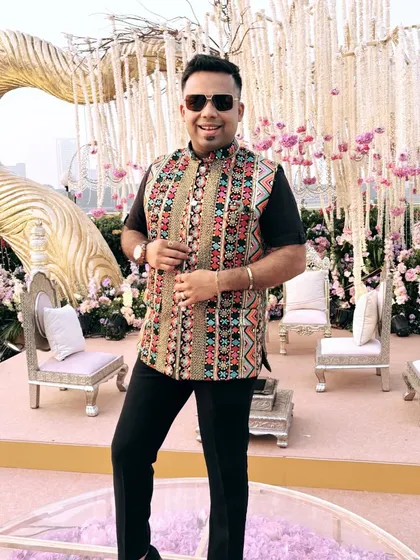 A full-length view of my semi-traditional outfit on a circular stage, ready to host a wedding ceremony.