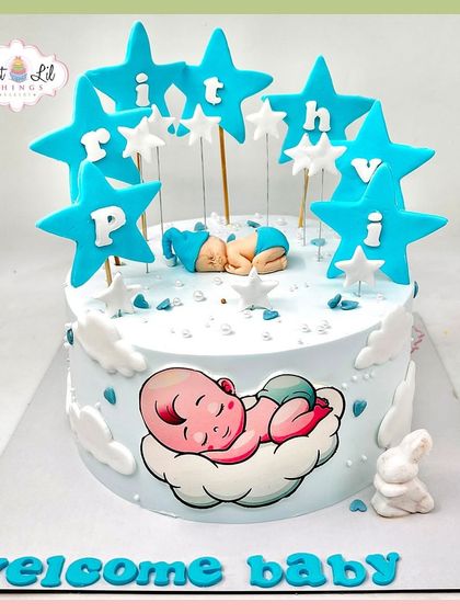 Welcome to the world, little Prithvi! This sweet baby announcement cake features a sleeping baby, fluffy clouds, and star-shaped name toppers.