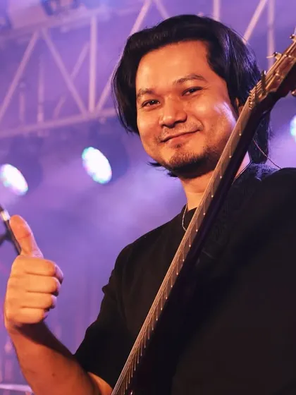 Our guitarist giving a thumbs-up during a successful brand launch party. We love collaborating with clients who want to create something unique and experimental for their events.