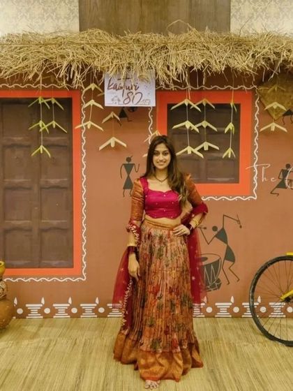 Our village house backdrop provides a colorful and interactive setting for guests to capture memories of the special day.