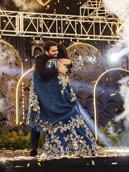 That post-performance hug says it all. The feeling of joy and accomplishment after nailing your couple's dance is what we aim for every single time.