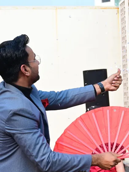 Creating a shower of bubbles with a fan, a simple yet beautiful piece of visual magic that delights audiences of all ages.
