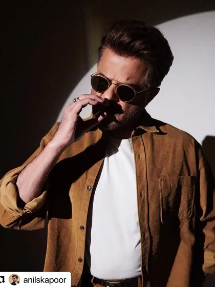 Another shot from "The Night Manager" promotion, capturing the cool and dangerous essence of his character.