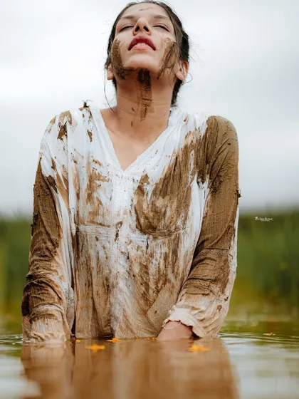 This is from a creative conceptual shoot in the paddy fields of Thrissur, showing my passion for unconventional, artistic portraits. These sessions are for those who want to create something truly unique and expressive.