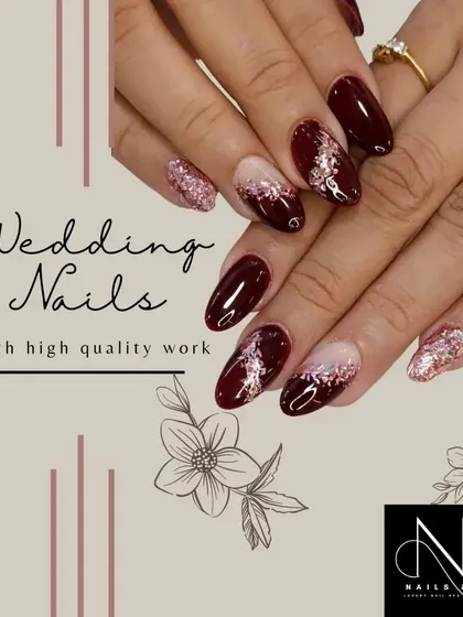 A deep and romantic choice for a wedding look. This design uses a rich maroon gel polish, sparkling rose gold glitter, and delicate silver foil accents for a truly luxurious finish.