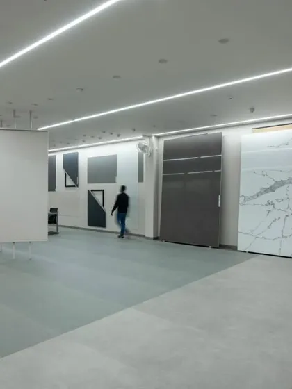 The Krsimar marble showroom, designed with a clean, minimalist aesthetic to let the stone slabs be the heroes. Linear lighting and an open layout create a gallery-like space for browsing.