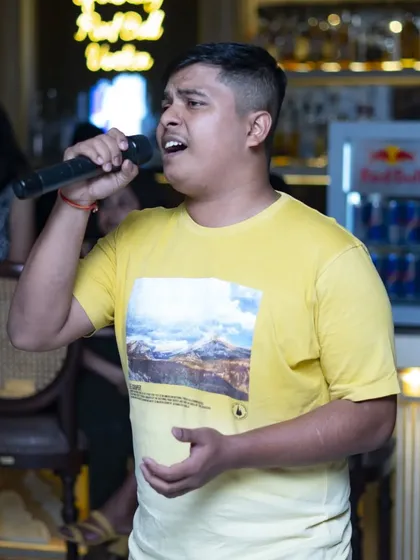 A passionate solo performance during one of my Sunday karaoke sessions. I make sure every singer gets their moment in the spotlight.