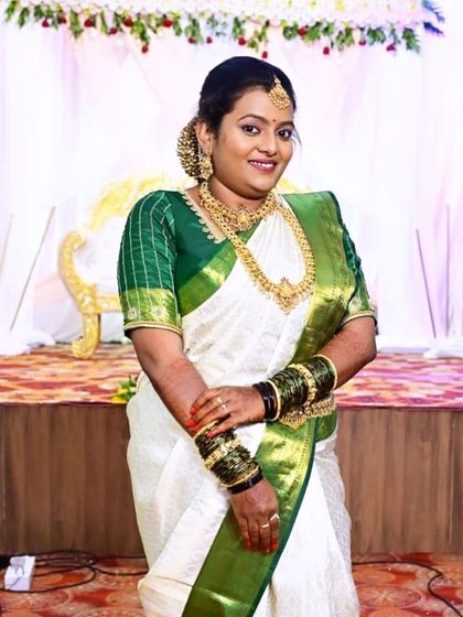 For her Muhurtham, Pushpa wanted a very minimal and natural look. I created a soft, subtle style that enhanced her features without feeling heavy.