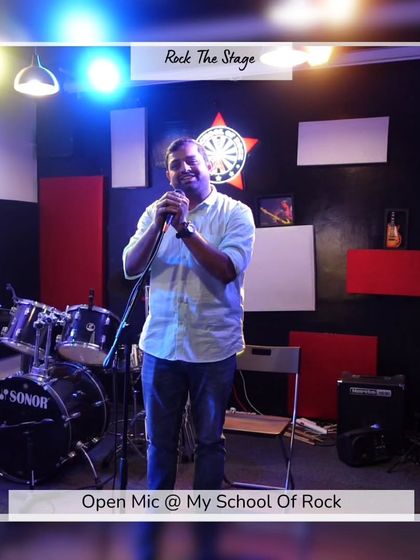 A storyteller sharing a personal tale. Our open mic is a space for all kinds of narratives, from funny anecdotes to profound life stories.