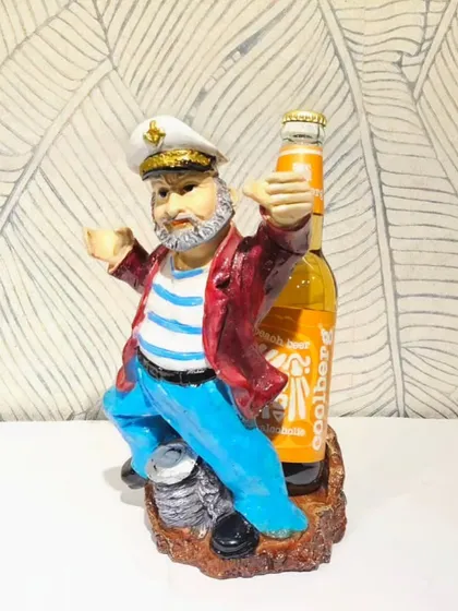 This sailor-themed bottle holder adds a fun, nautical vibe to any home bar.