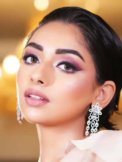 Another angle of the dramatic eye makeup, showing the beautiful blending and the pop of color.