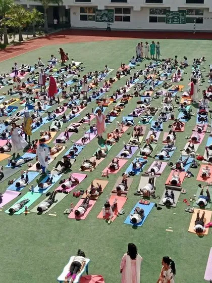 Wellness is at the core of our educational philosophy. Our entire school community comes together for a mass yoga session on International Yoga Day, embracing mindfulness and physical health on our expansive sports ground.