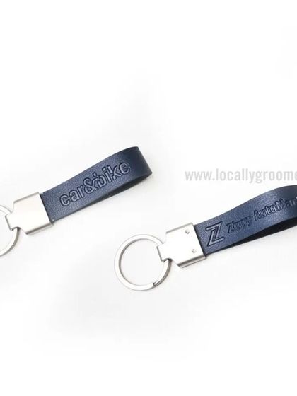 These custom leather keychains are a simple, elegant, and durable gift. We branded these for Car & Bike, showcasing our precise engraving on quality materials.