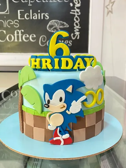 Another action-packed Sonic the Hedgehog cake. This design recreates the classic game level with blocky terrain and a prominent character cutout.