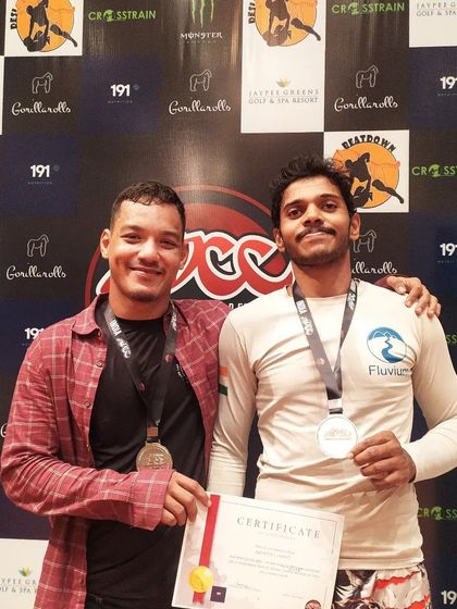 With friends and fellow medalists at the ADCC India 2023 event. The grappling community is full of tough, respectful athletes.