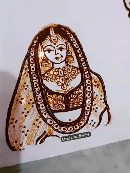 Another practice sketch of a front-facing bride. I focus on getting the details of the jewelry and expression just right for my portrait mehndi.