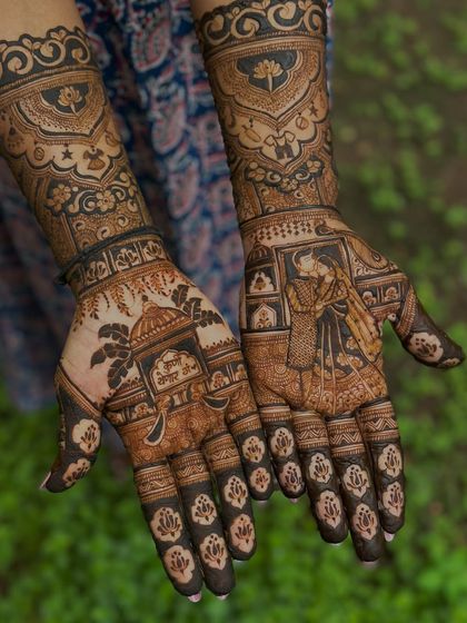 A beautiful way to announce a new chapter! This maternity mehendi features a loving couple portrait and the sweet message "It's a Girl," celebrating the upcoming arrival.