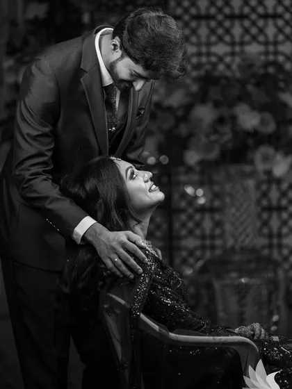 A beautiful black and white photo of the couple. This timeless shot captures the emotion and connection between them, with the makeup adding to the bride's elegance.