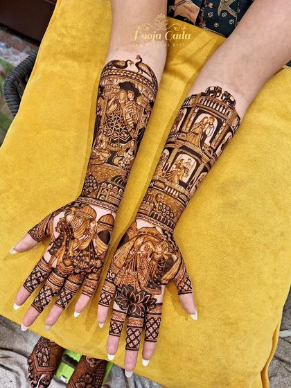 A heavy bridal design featuring multiple couple portraits, each capturing a different moment from their love story, set within ornate architectural frames.