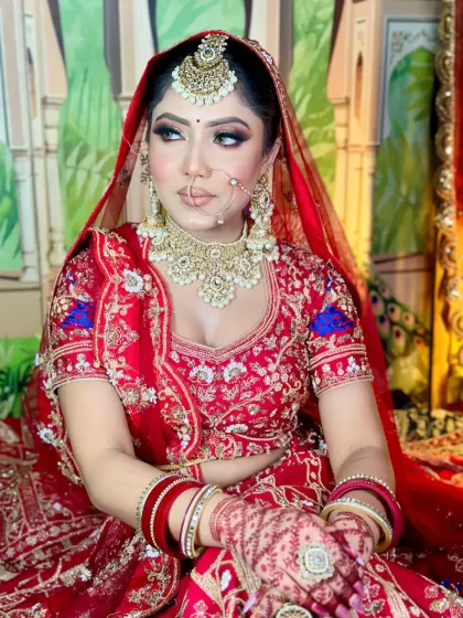 A portrait of a bride ready for her ceremony. The makeup is balanced, with strong eyes and lips that stand out without overpowering her natural features.