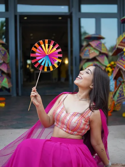 In adulthood, I conspire every day to bring back my childhood. A playful moment with a pinwheel, because you should never lose your inner child.