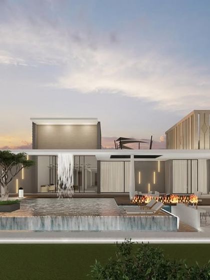 This resort-style backyard concept includes a multi-level pool, a waterfall feature, and various lounge areas. It is a vision of ultimate outdoor luxury, designed for both relaxation and grand-scale entertaining.
