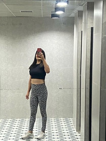 A quick mirror selfie after a good workout. Feeling strong and accomplished.