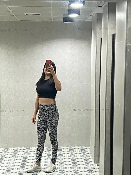 A quick mirror selfie after a good workout. Feeling strong and accomplished.