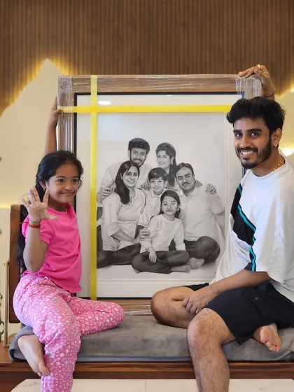 This is what it's all about. Seeing a family's joy as they unbox a portrait that took me over 75 hours to create. This large-scale piece was a composite, bringing together six family members from three different photographs into one shared memory.